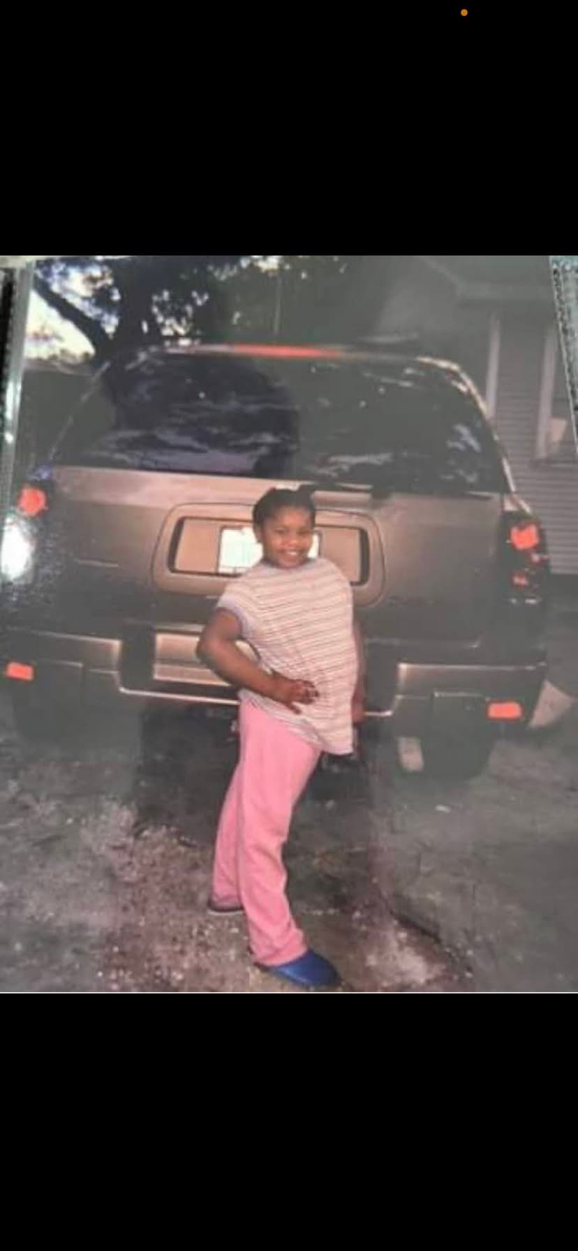 Shayna as a young girl in elementary school
