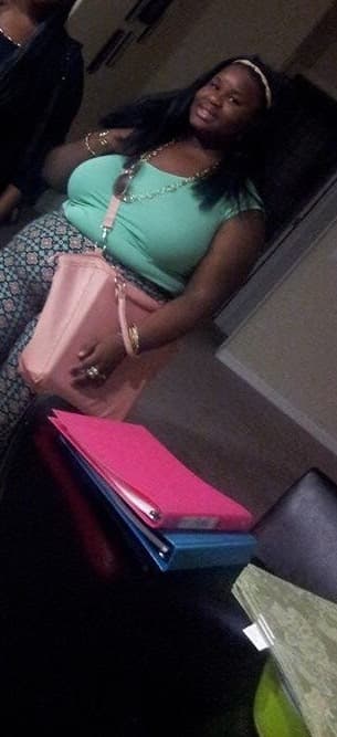 Shayna as a high-school student with her school binders