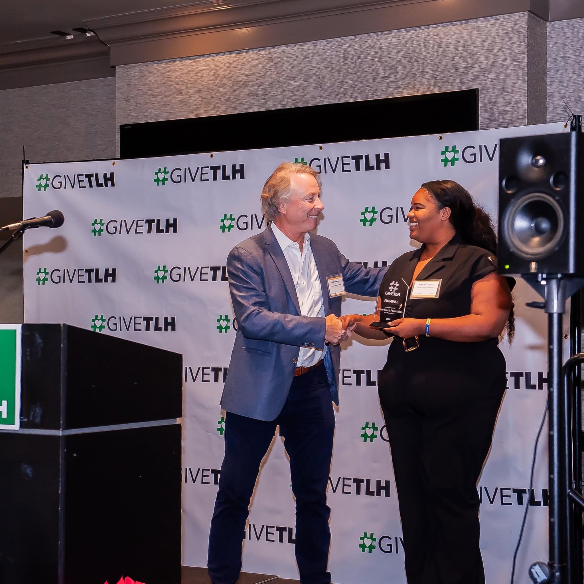 Shayna Vincent receiving recognition for Esther Funds Foundation